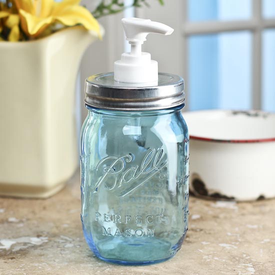 Vintageinspired_galvanized_lid_with_blue_mason_jar_dispenser